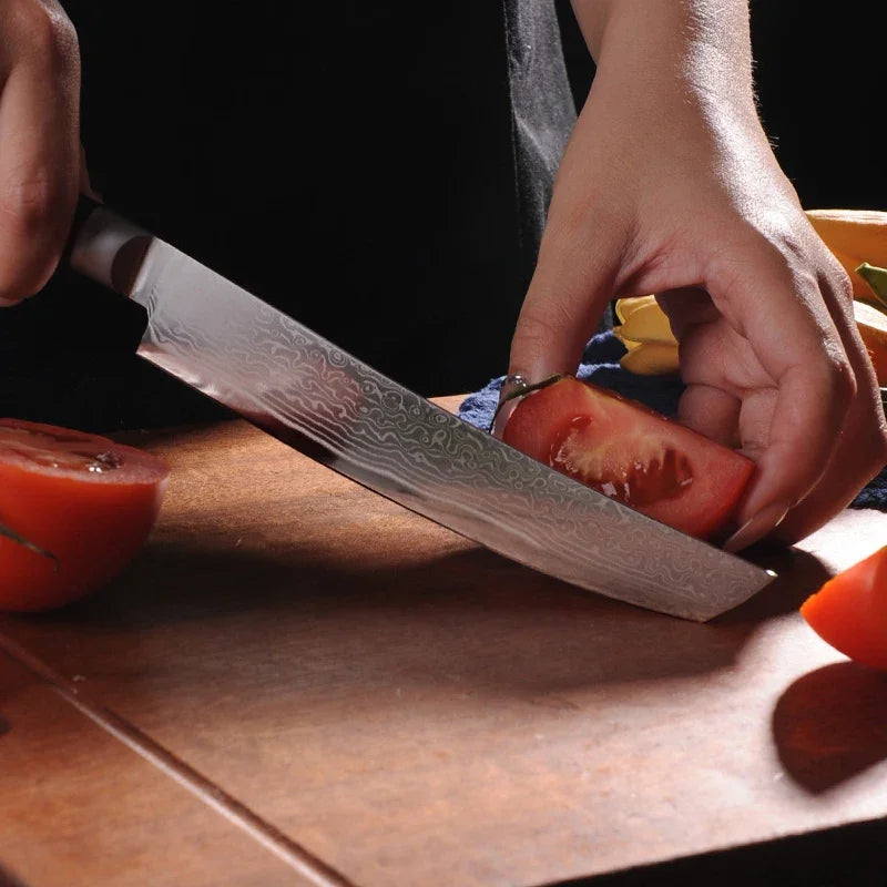 Maison Verdane 67-layer Damascus 6-inch Japanese chef's knife with a sharp, patterned blade for precise culinary tasks.